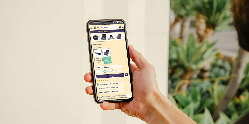 Dutch Headshop productpagina op een smartphone, waarin de staffelkorting wordt uitgelegd.